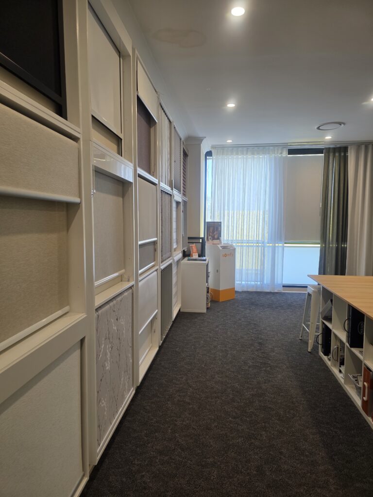 Blind display boards and curtains in the Cobb & Co Blinds Campbelltown showroom