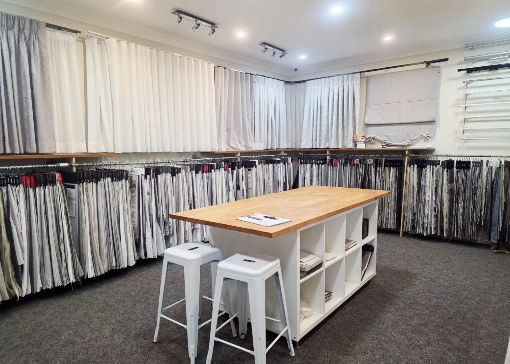 Wide view of the curtain fabric room in the Cobb & Co Blinds Campbelltown showroom